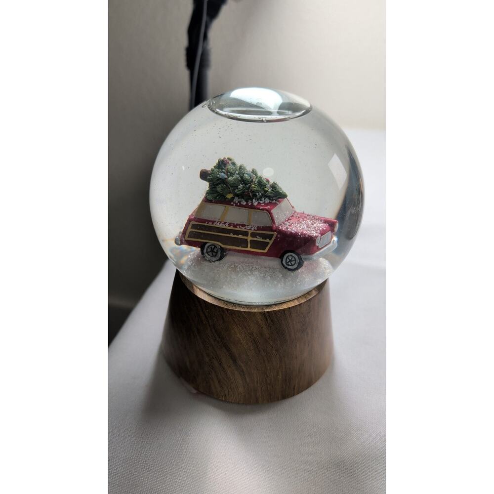 Christmas Snow Globe with Red Woody Station Wagon Car and Tree on Wood Base